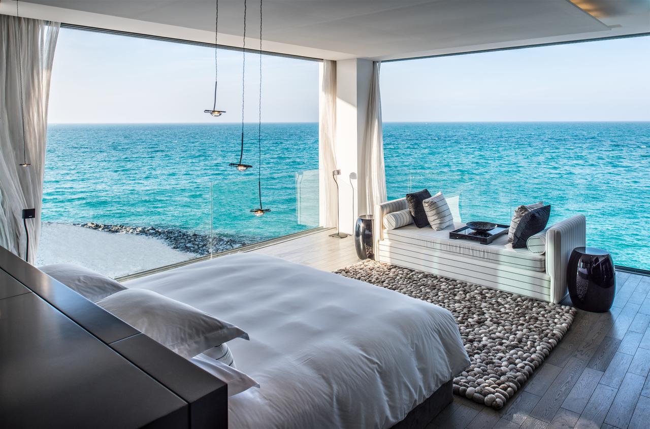 מלון אבו דאבי Nurai Island, Saadiyat חדר תמונה The bedroom of a private villa at the resort
